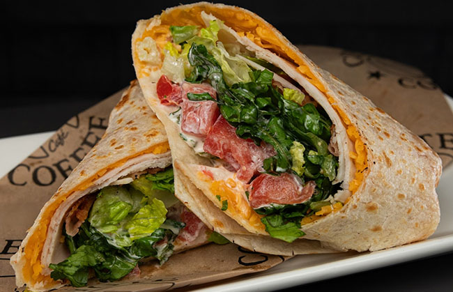 Turkey, bacon, ranch, lettuce, tomato, cheddar cheese, grilled on a flour wrap